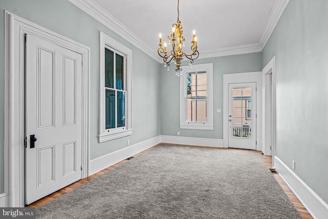 3 E Poplar St, Wenonah, NJ 08090 - unfurnished room featuring a chandelier, wood finished floors, crown molding, and baseboards