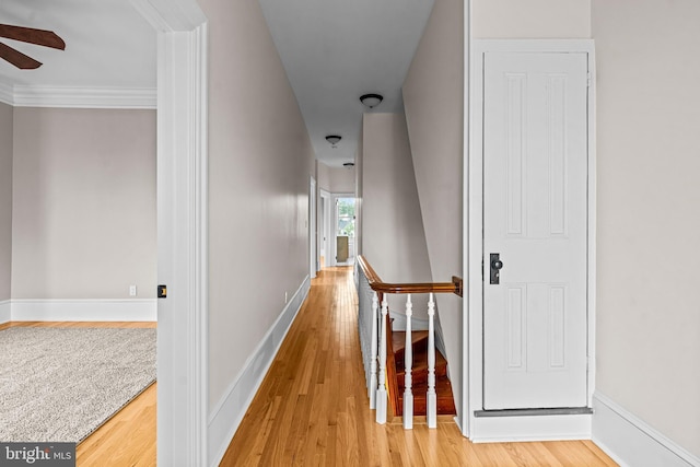 3 E Poplar St, Wenonah, NJ 08090 - corridor featuring an upstairs landing, wood finished floors, baseboards, and crown molding