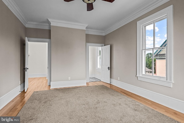 3 E Poplar St, Wenonah, NJ 08090 - spare room with ceiling fan, light wood-style floors, healthy amount of natural light, crown molding, and baseboards