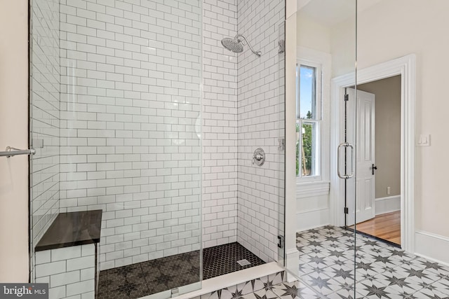 3 E Poplar St, Wenonah, NJ 08090 - full bath with a stall shower, tile patterned floors, and baseboards