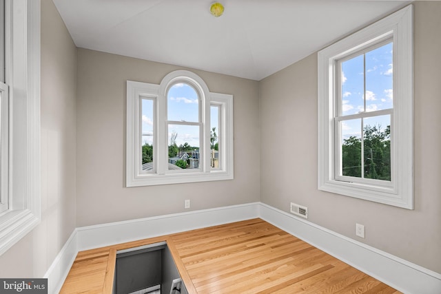 3 E Poplar St, Wenonah, NJ 08090 - unfurnished room featuring plenty of natural light, baseboards, and wood finished floors