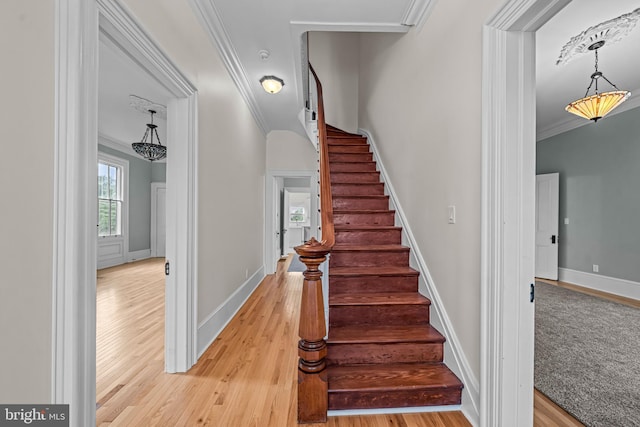 3 E Poplar St, Wenonah, NJ 08090 - stairs featuring ornamental molding, wood finished floors, and baseboards