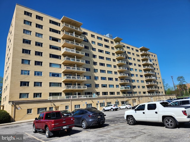 7121 Park Heights Ave Unit 206, Baltimore, MD 21215 - view of apartment building / complex with uncovered parking
