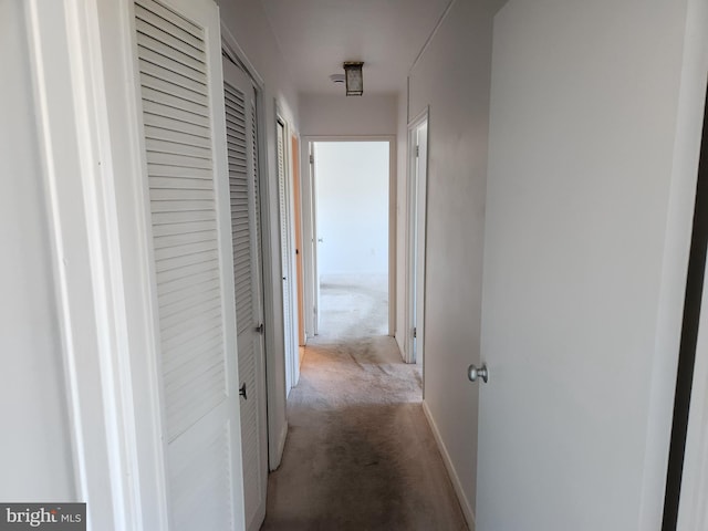 7121 Park Heights Ave Unit 206, Baltimore, MD 21215 - hall featuring carpet and baseboards