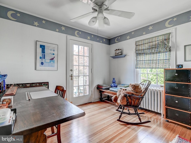 326 Saint Dunstans Rd, Baltimore, MD 21212 - office space featuring wood finished floors, crown molding, ceiling fan, and radiator heating unit