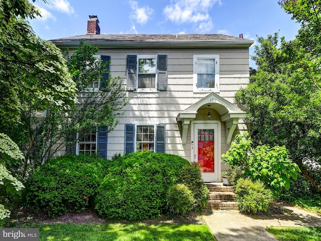 326 Saint Dunstans Rd, Baltimore, MD 21212 - colonial inspired home featuring a chimney
