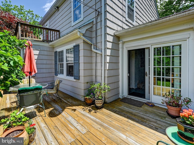326 Saint Dunstans Rd, Baltimore, MD 21212 - wooden terrace with outdoor dining area