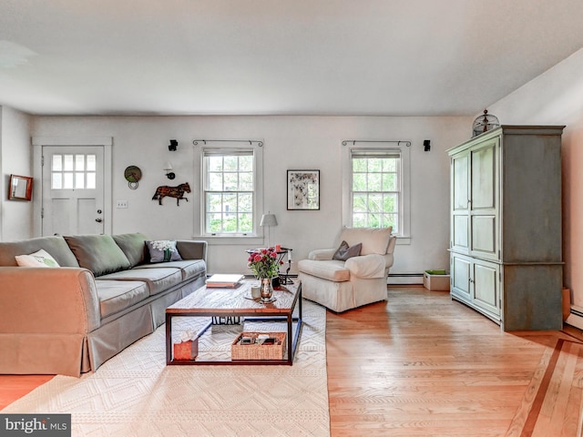 326 Saint Dunstans Rd, Baltimore, MD 21212 - living room with light wood-type flooring and baseboard heating