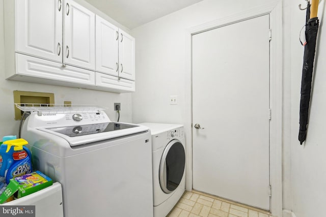 4270 Deborah Ct, Mount Airy, MD 21771 - washroom featuring washer and clothes dryer, cabinet space, and brick patterned flooring
