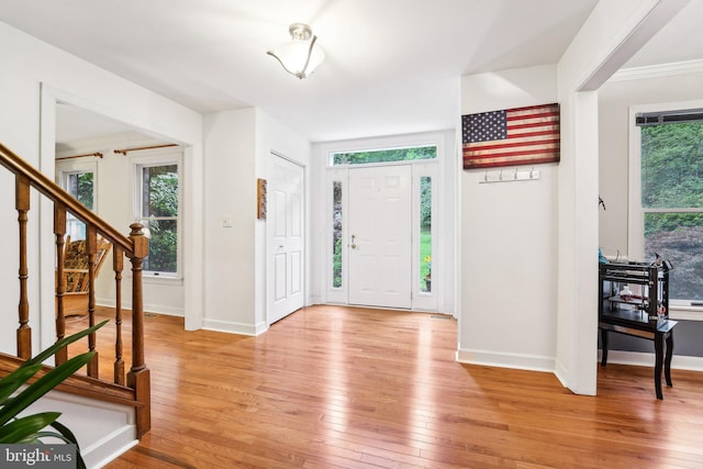 4270 Deborah Ct, Mount Airy, MD 21771 - entrance foyer with light wood-type flooring, stairs, and baseboards