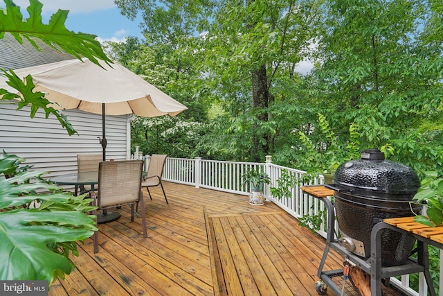 4270 Deborah Ct, Mount Airy, MD 21771 - wooden deck with outdoor dining space, a grill, and view of wooded area