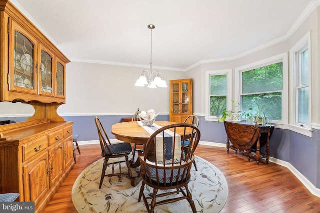 4270 Deborah Ct, Mount Airy, MD 21771 - dining area with light wood-style floors, a chandelier, ornamental molding, and baseboards