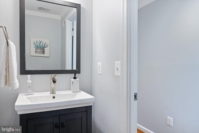 6600 Rockleigh Way, Alexandria, VA 22315 - bathroom with ornamental molding and vanity