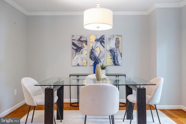 6600 Rockleigh Way, Alexandria, VA 22315 - dining area with wood finished floors, baseboards, and ornamental molding