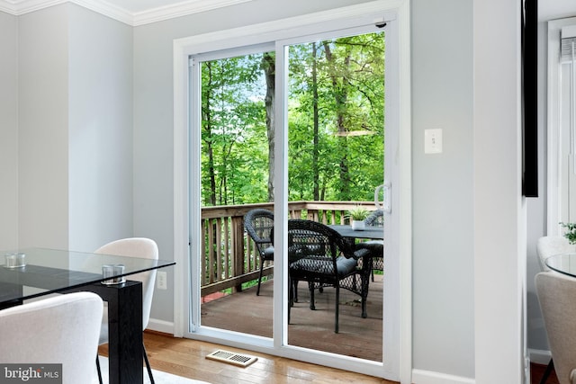 6600 Rockleigh Way, Alexandria, VA 22315 - dining area featuring crown molding, wood finished floors, and baseboards