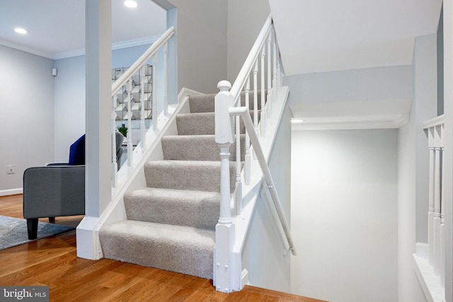 6600 Rockleigh Way, Alexandria, VA 22315 - stairs with crown molding, wood finished floors, and recessed lighting