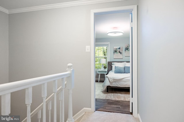 6600 Rockleigh Way, Alexandria, VA 22315 - hallway with an upstairs landing, ornamental molding, baseboards, and carpet flooring