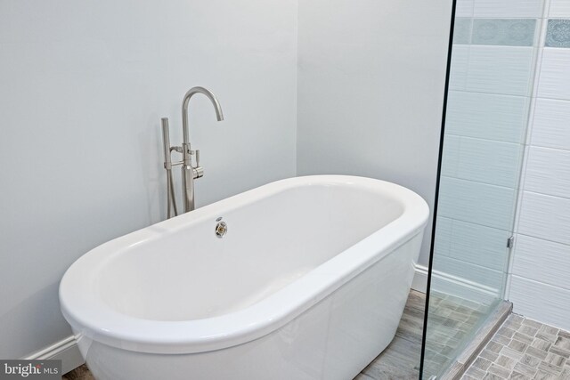 6600 Rockleigh Way, Alexandria, VA 22315 - full bathroom featuring a freestanding tub and baseboards
