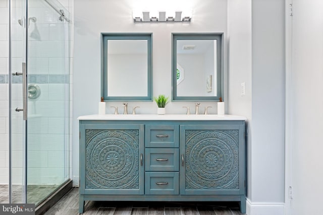 6600 Rockleigh Way, Alexandria, VA 22315 - full bath featuring a shower stall, wood finished floors, and double vanity