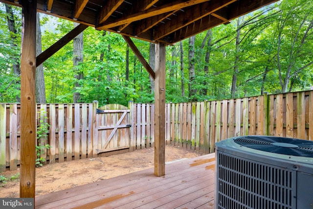 6600 Rockleigh Way, Alexandria, VA 22315 - deck featuring central air condition unit, a gate, and a fenced backyard