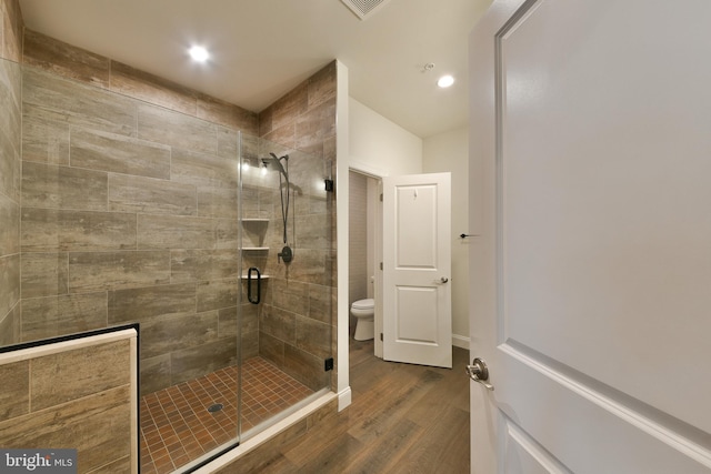 45 Lavender Dr, Yardley, PA 19067 - bathroom featuring a shower stall, wood finished floors, toilet, and recessed lighting