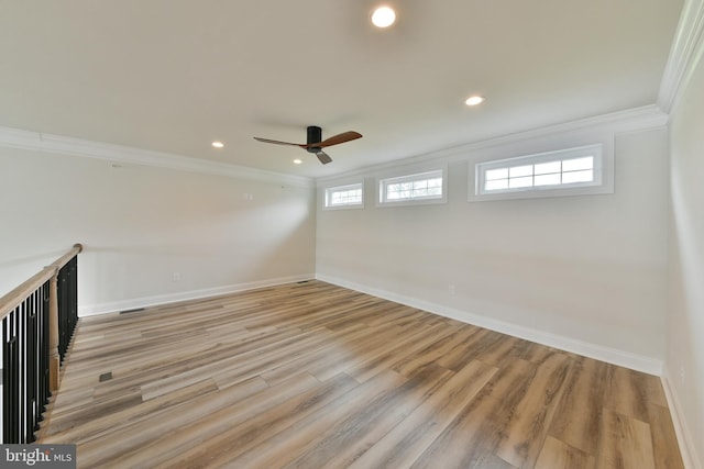 45 Lavender Dr, Yardley, PA 19067 - unfurnished room featuring crown molding, baseboards, a ceiling fan, light wood-style flooring, and plenty of natural light