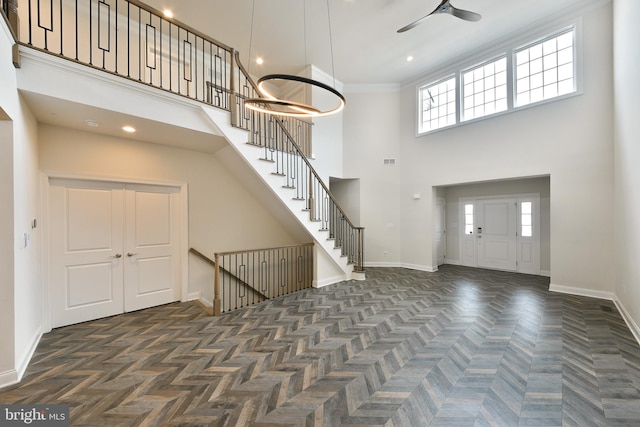 45 Lavender Dr, Yardley, PA 19067 - foyer entrance with a towering ceiling, baseboards, a ceiling fan, and crown molding