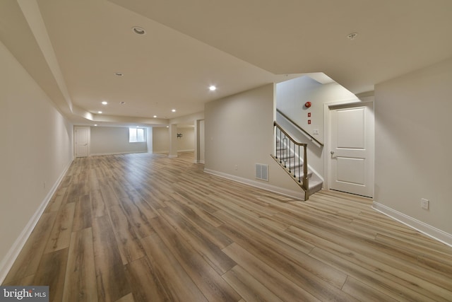 45 Lavender Dr, Yardley, PA 19067 - unfurnished living room with light wood-type flooring, stairs, recessed lighting, and baseboards