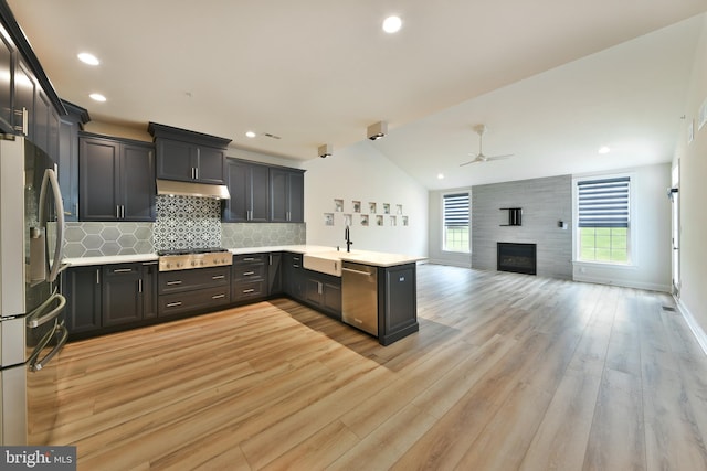 45 Lavender Dr, Yardley, PA 19067 - kitchen with appliances with stainless steel finishes, ceiling fan, tasteful backsplash, lofted ceiling, and under cabinet range hood