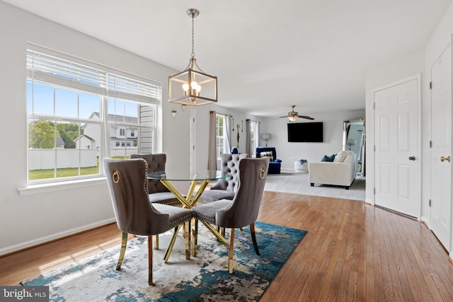 140 N Allwood Dr, Hanover, PA 17331 - dining room with a chandelier, wood-type flooring, a ceiling fan, and baseboards