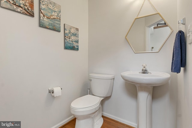 140 N Allwood Dr, Hanover, PA 17331 - bathroom with wood finished floors, baseboards, and toilet