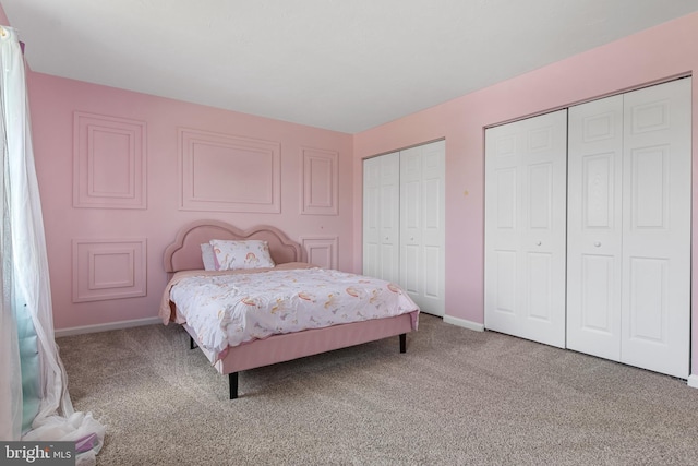 140 N Allwood Dr, Hanover, PA 17331 - carpeted bedroom featuring two closets and baseboards