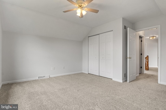140 N Allwood Dr, Hanover, PA 17331 - unfurnished bedroom with carpet floors, baseboards, a closet, vaulted ceiling, and ceiling fan