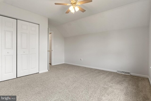 140 N Allwood Dr, Hanover, PA 17331 - unfurnished bedroom featuring lofted ceiling, carpet flooring, a closet, baseboards, and a ceiling fan