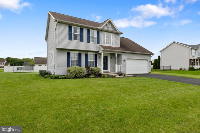 140 N Allwood Dr, Hanover, PA 17331 - view of front of house featuring driveway, a garage, central AC, and a trampoline