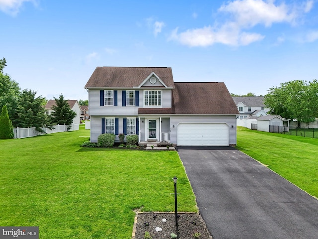 140 N Allwood Dr, Hanover, PA 17331 - colonial home with driveway, a garage, and roof with shingles