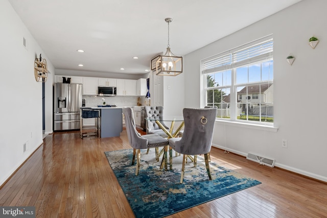 140 N Allwood Dr, Hanover, PA 17331 - dining room with hardwood / wood-style floors, a chandelier, baseboards, and recessed lighting