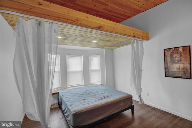 918 Spring St, Reading, PA 19604 - bedroom featuring wooden ceiling, baseboards, and wood finished floors
