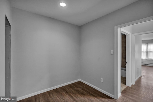 918 Spring St, Reading, PA 19604 - empty room featuring dark wood finished floors, baseboards, a baseboard radiator, and recessed lighting