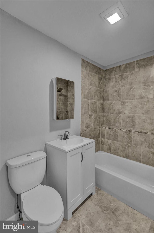 918 Spring St, Reading, PA 19604 - bathroom featuring vanity, toilet, and tub / shower combination