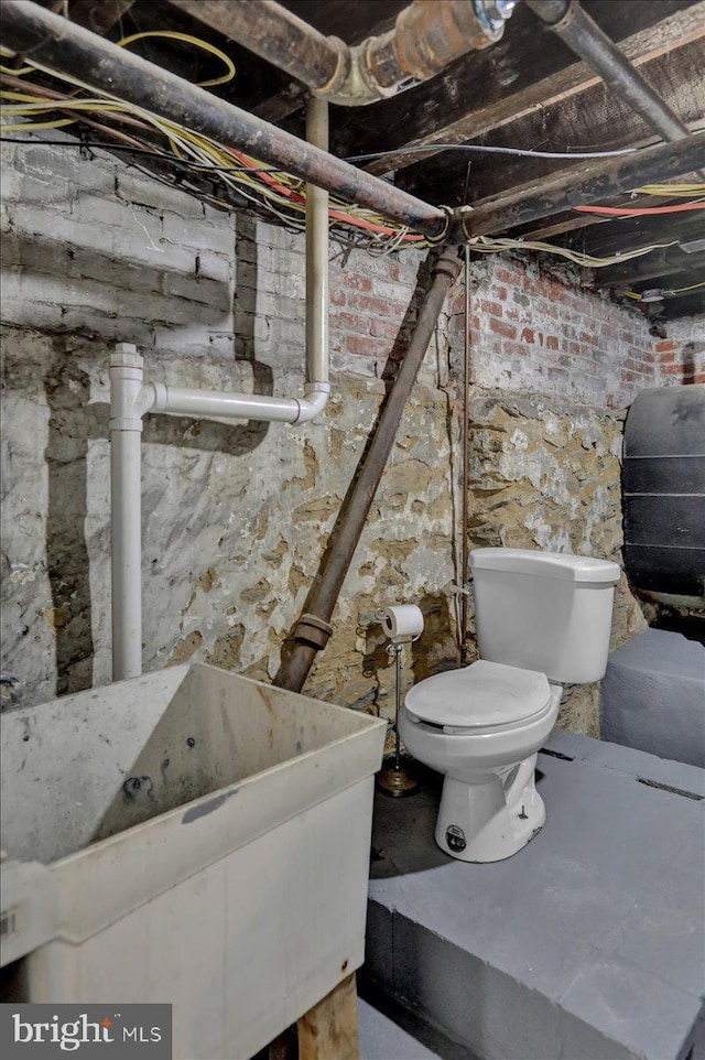 918 Spring St, Reading, PA 19604 - unfinished basement with heating fuel and a sink