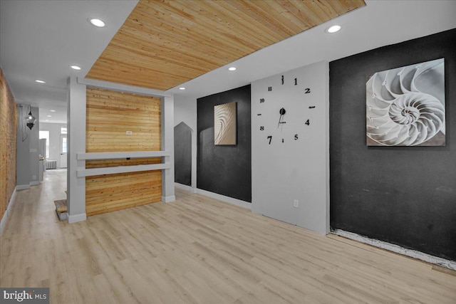 918 Spring St, Reading, PA 19604 - unfurnished living room featuring recessed lighting, wooden ceiling, wood finished floors, and baseboards