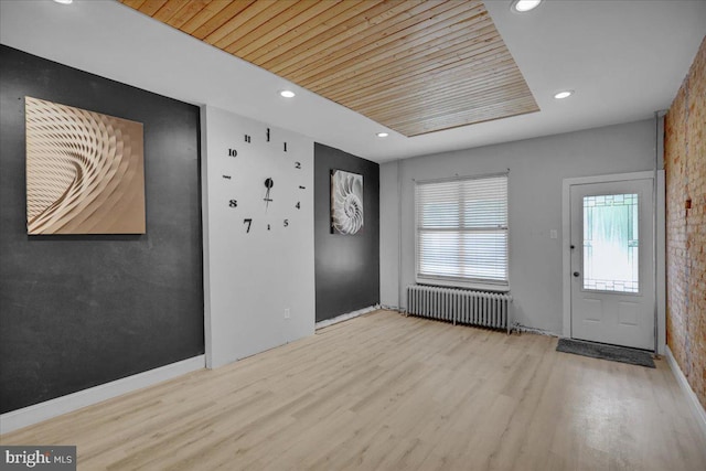 918 Spring St, Reading, PA 19604 - entrance foyer with radiator, wooden ceiling, wood finished floors, recessed lighting, and baseboards