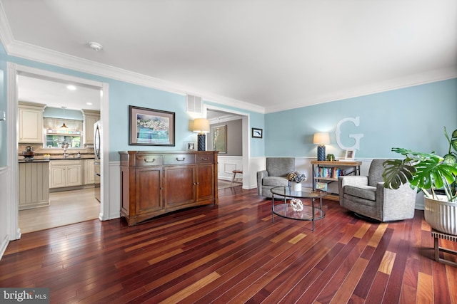 202 Prancer Rd, Egg Harbor Township, NJ 08234 - living room featuring dark wood-style flooring, crown molding, and a wainscoted wall