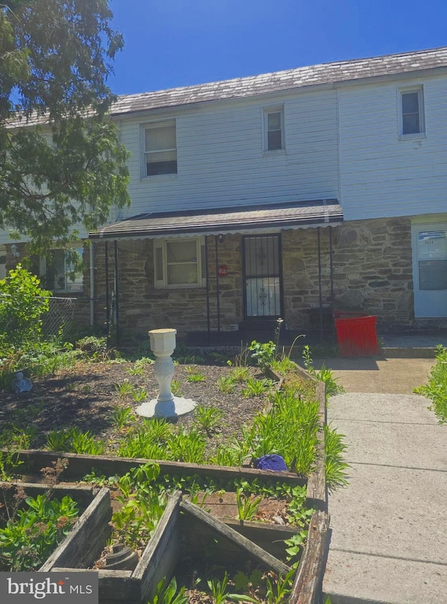 4926 Edgemere Ave, Baltimore, MD 21215 - view of front facade with stone siding and a porch
