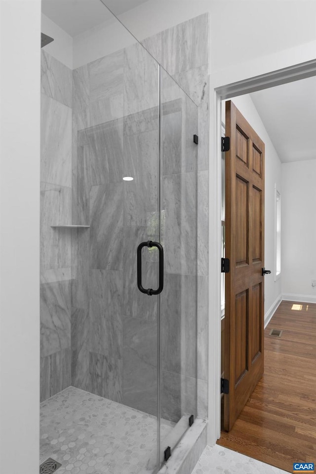 329 Carrsbrook Dr, Charlottesville, VA 22901 - full bath featuring a shower stall, wood finished floors, and baseboards