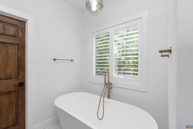 329 Carrsbrook Dr, Charlottesville, VA 22901 - full bathroom with a soaking tub and baseboards