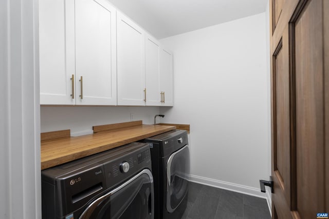 329 Carrsbrook Dr, Charlottesville, VA 22901 - washroom featuring cabinet space, washer and clothes dryer, and baseboards