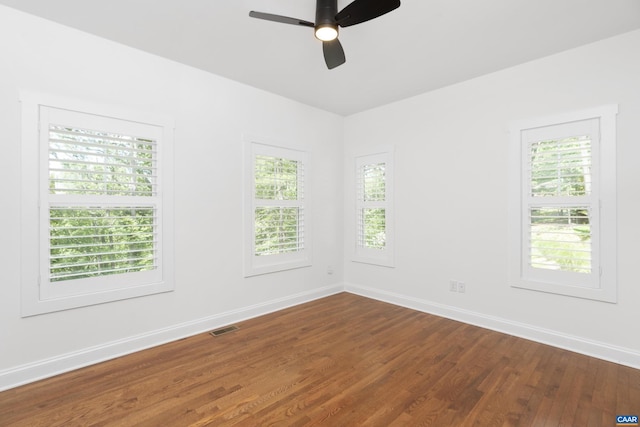 329 Carrsbrook Dr, Charlottesville, VA 22901 - unfurnished room with baseboards, dark wood-style flooring, healthy amount of natural light, and a ceiling fan