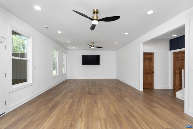 329 Carrsbrook Dr, Charlottesville, VA 22901 - unfurnished living room with wood finished floors, ceiling fan, recessed lighting, and baseboards